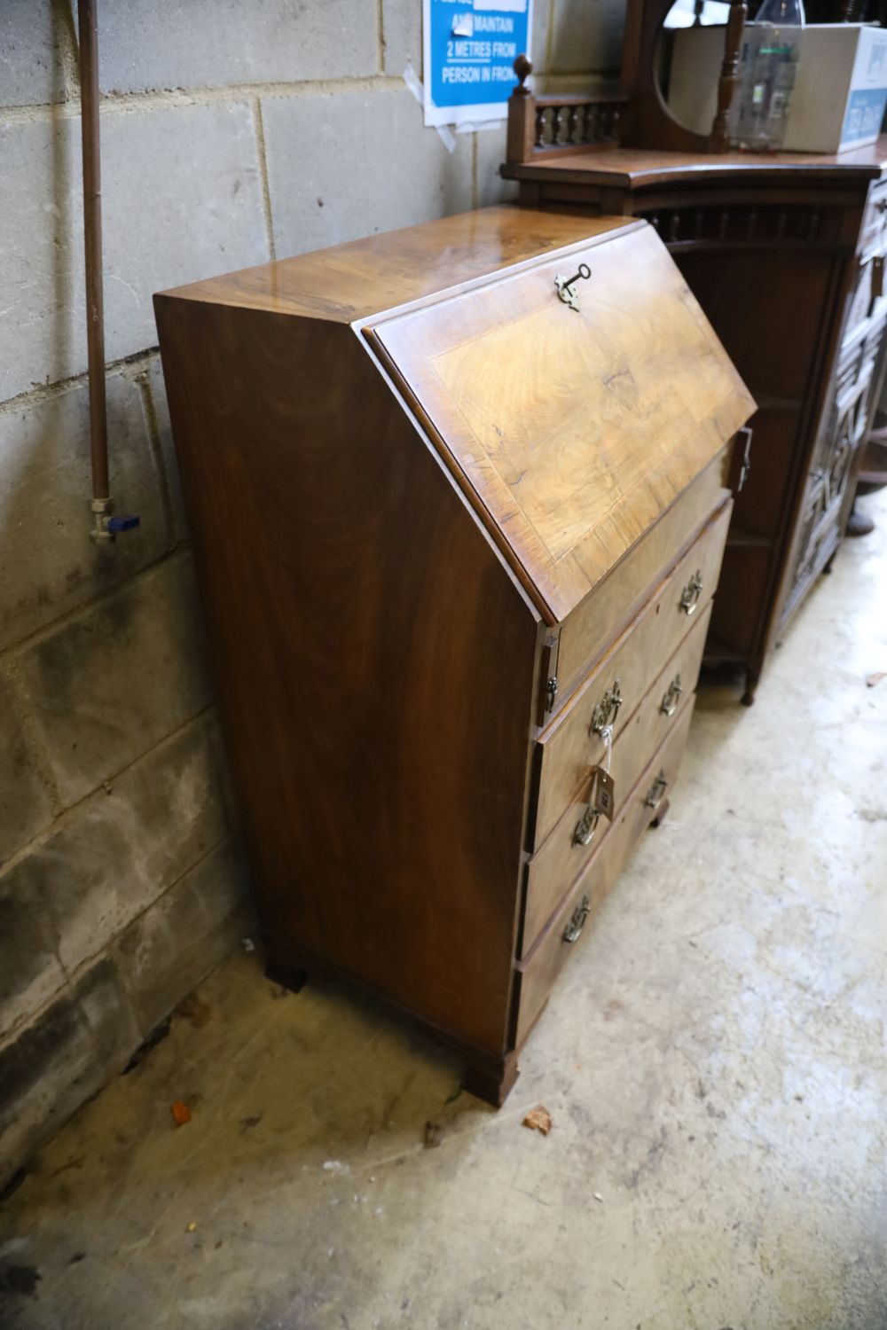 An early 20th century George I style walnut bureau, width 66cm, depth 40cm, height 100cm